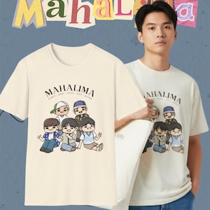 May include: Cream-colored t-shirt featuring the word "MAHALIMA" in colorful letters. The shirt displays a cartoon illustration of six figures and the text "MAHALIMA" above their heads. The text "NOW AVAILABLE" and Etsy shop name are at the bottom.