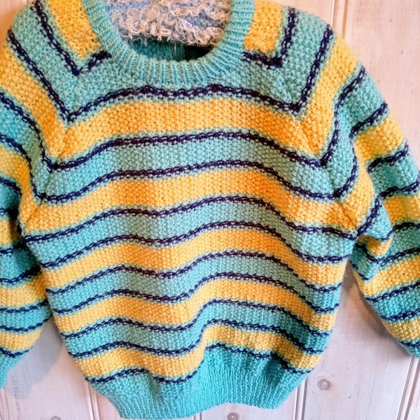 Boys or girls jumper size  3 - 4 years in blue, yellow and navy blue moss stitch stripe