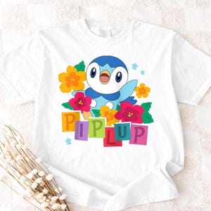 Piplup Pokémon Comfort Colors Shirt, Happy Piplup Colorful Floral Tee, Kawaii Anime Flower T-Shirt, Pastel Aesthetic Piplup Gift, Pkm Gifts image 3