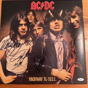 Vinilo autografiado de AC/DC Highway to Hell con certificado de autenticidad.