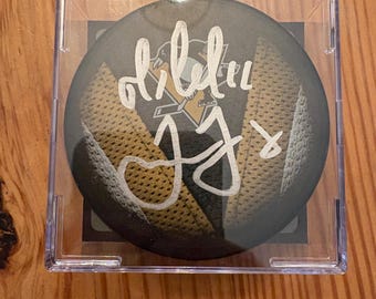 Disco da hockey autografato da Jaromir Jagr e Mario Lemieux con certificato di autenticità.
