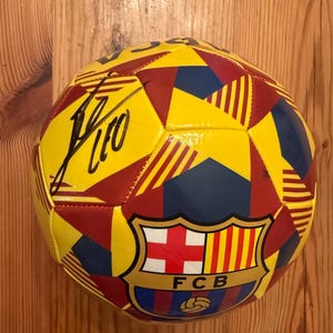 Lionel Messi signed FC Barcelona ball with COA