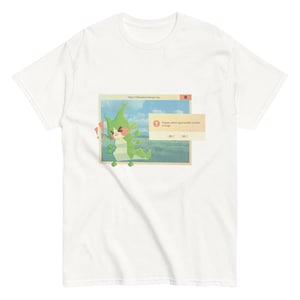 May include: A white short-sleeve t-shirt featuring a graphic print of a computer window displaying a green, segmented, insect-like creature. The window includes the text 'Please select appropriate number of hugs' and two numerical input boxes.