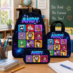 May include: A black backpack, lunch bag, and pencil case set featuring a galaxy print background, the name ANDY in colorful gradient letters, and a grid of nine cartoon character illustrations in vibrant square frames on each item.