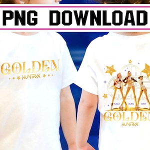 May include: White t-shirts with gold text and graphics. One shirt features the word "GOLDEN" with stars and the text "HUNTRAX". The other shirt has a graphic of three figures and the text "GOLDEN HUNTRAX". The top banner says "PNG DOWNLOAD".