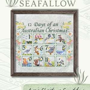 May include: Framed cross-stitch artwork titled "12 Days of an Australian Christmas." The design features twelve squares with Australian animals and flora. The artwork is 225W x 176H, or 40.8 x 31.9 cm. The text "Aussie Christmas Countdown" is also present.
