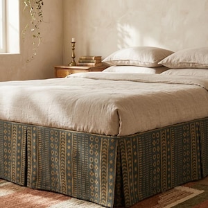 May include: A set of three ceramic mugs with a speckled, matte finish. The mugs are in shades of cream, light gray, and dark gray. Each mug has a simple, minimalist design, perfect for coffee or tea.