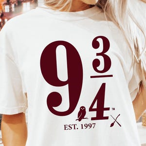 May include: A set of three ceramic mugs with a speckled, matte finish. The mugs are in shades of cream, light gray, and dark gray. Each mug has a simple, minimalist design, perfect for coffee or tea.