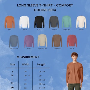 May include: A display of long-sleeve comfort t-shirts in various colors, including yam, white, black, pepper, seafoam, and ivory. The image also shows blue jean, violet, sandstone, espresso, and brick colored shirts. Measurements are provided for sizes S to 2XL.