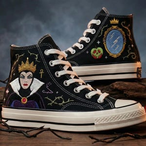 May include: A set of three ceramic mugs with a speckled, matte finish. The mugs are in shades of cream, light gray, and dark gray. Each mug has a simple, minimalist design, perfect for coffee or tea.