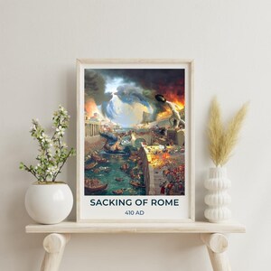 May include: A framed print depicting the Sacking of Rome in 410 AD. The artwork shows a chaotic scene with burning buildings, boats on a river, and a large crowd of people. The title "SACKING OF ROME" and the date "410 AD" are printed at the bottom.