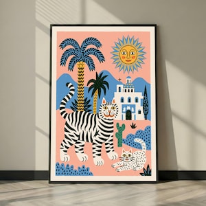 Puede incluir: Una lámina artística enmarcada que muestra un tigre blanco con rayas negras y un gato más pequeño con manchas. La escena incluye un sol amarillo, palmeras azules, un edificio blanco con cúpula azul y un cactus sobre fondo rosa claro.