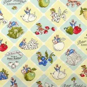 May include: Fabric featuring The Tale of Peter Rabbit by Beatrix Potter with a diamond pattern in light blue and yellow. The print displays Peter Rabbit interacting with various fruits, vegetables, and mushrooms, including grapes, apples, lettuce, and berries.