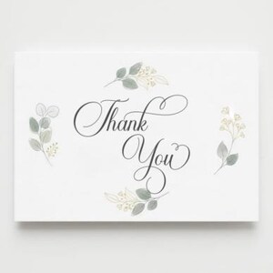 May include: White card with the words "Thank You" in elegant script. The card is decorated with watercolor-style botanical illustrations in shades of green and cream, creating a soft, natural aesthetic.