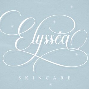 May include: A light blue background with the white text "Elyssea Skincare" in an elegant, cursive font. Small white star shapes are scattered across the background, adding a subtle sparkle.