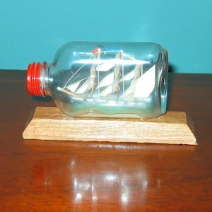 Ship in a Bottle FRIGATE on Wooden Stand from Robin Hood&#39;s Bay