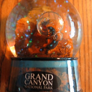 Grand Canyon National Park Schneekugel mit Kopopelli Musiker