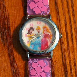 DISNEY Licensed DISNEY PRINCESSES Watch w/ Purple strap/ Fresh Battery