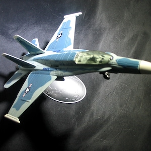 McDonnell Douglas F-18 Striker Fighter Jet BLUE DOLPHINS SQAUDRON on Metal Stand - Can be displayed 3 ways.