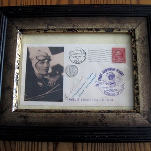 FRAMED 1929 Commemorative Envelope featuring Ameiia Earhart&#39;s 2 Early Accomplishments w/Signature, 1929 Mercury Silver Dime and Period Stamp