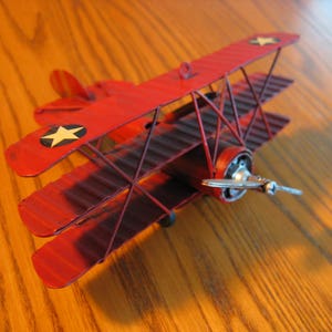 Red SOPWITH  Tri-plane metal airplane model from WWI with STARS