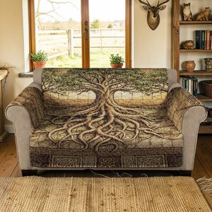 May include: A sofa with a tree of life tapestry cover. The cover features a detailed illustration of a tree with extensive roots and a leafy canopy. The color palette includes shades of brown, green, and beige, creating a natural and earthy aesthetic.