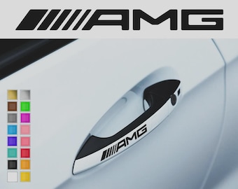 May include: Black AMG logo and a matching decal on a car door handle. The image also shows a color chart with various color options. The car is white.