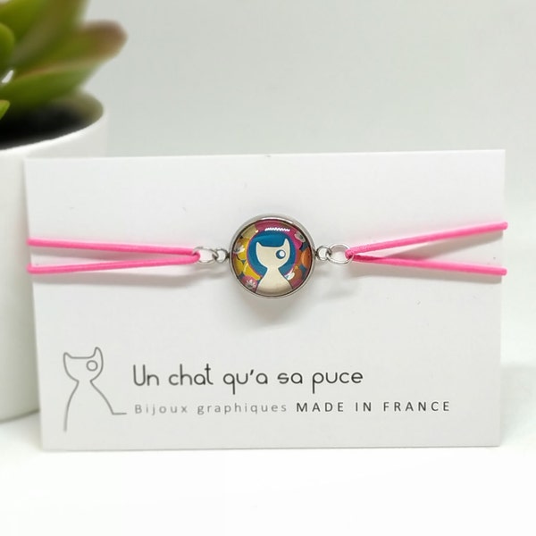 Bracelet élastique à cabochon à motif chat blanc fond graphique rose et bleu