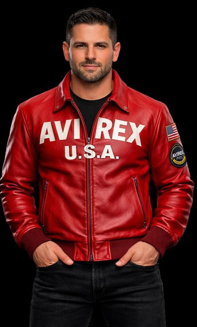 May include: A bright red leather jacket featuring a fold-down collar, a full-length front zipper, and dark red ribbed cuffs and hem. The chest displays white text reading AVI REX U.S.A., while the left sleeve features a small American flag patch.