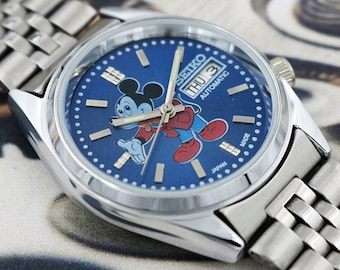 Vintage Refurbished Seiko 5 Japan Automatic Men’s Watch Blue Cartoon Dial Day Date - 600-08