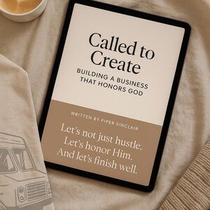 May include: A digital tablet displays the text "Called to Create" with the subtitle "Building a Business That Honours God." The text "Written by Piper Sinclair" is below. A cup of coffee with latte art and a t-shirt with a van graphic are also visible.