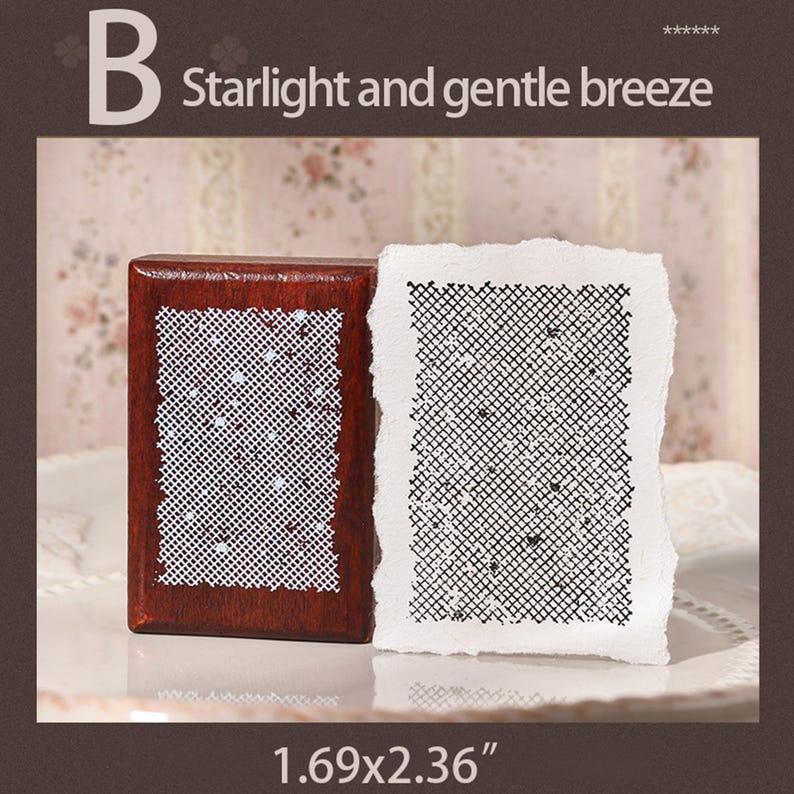 May include: A rectangular wooden stamp with a dark brown finish and a white rubber surface featuring a grid pattern with small dots, accompanied by a white paper print showing the black grid design. The text B Starlight and gentle breeze 1.69x2.36" is visible.