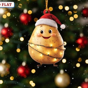 May include: A whimsical Christmas tree ornament shaped like a potato wearing a Santa hat and wrapped in string lights. The ornament has a smiling face and small feet. The background features a decorated Christmas tree with red and gold ornaments.