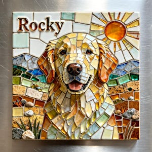 May include: A square mosaic tile art piece featuring a golden retriever dog with the name Rocky written in dark letters at the top left. The design includes a bright orange sun, a blue sky, and a textured landscape made of colourful glass tiles.