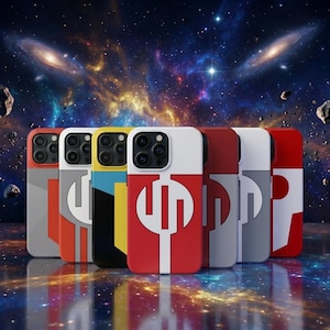 May include: A collection of colorful phone cases with a unique design. The cases feature a red, white, gray, yellow, and black color scheme with a stylized graphic. The background showcases a vibrant space scene with galaxies and stars.
