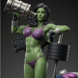 May include: A green-skinned figure with long dark hair wearing a purple lace bra and matching bikini bottom. The figure holds a large metallic water jug in one hand and leans against a black barbell weight stack, wearing silver wrist cuffs.