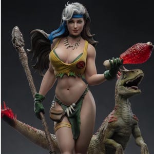 May include: A collectible figurine of a character with long brown hair and a white streak, wearing a yellow top with a red X emblem, a green loincloth, and a necklace. The figure holds a wooden staff and a red meat bone, standing beside a dinosaur.