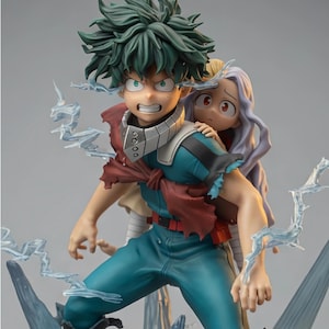 May include: A detailed anime figurine featuring a green-haired character with a determined expression carrying a small, light-haired character on their back. The figure wears a teal and red suit with silver accents, surrounded by translucent blue energy effects.