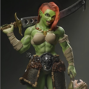 May include: A green-skinned orc figurine with vibrant orange hair, holding a large curved sword over the shoulder. The figure wears a beige top, tan arm wraps, and a dark brown fur skirt with a central skull-shaped belt buckle and necklace.