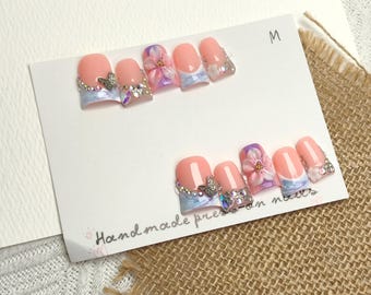 Set de uñas postizas rosas hechas a mano estilo francés | 10 uñas postizas con forma de pico de pato, diseño de flor de cerezo y diamantes de imitación, reutilizables