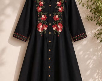 May include: A black midi-length dress featuring a V-neckline and a full-length front button closure. The bodice is decorated with red and pink floral embroidery, and the three-quarter length sleeves have matching floral embroidery at the cuffs.