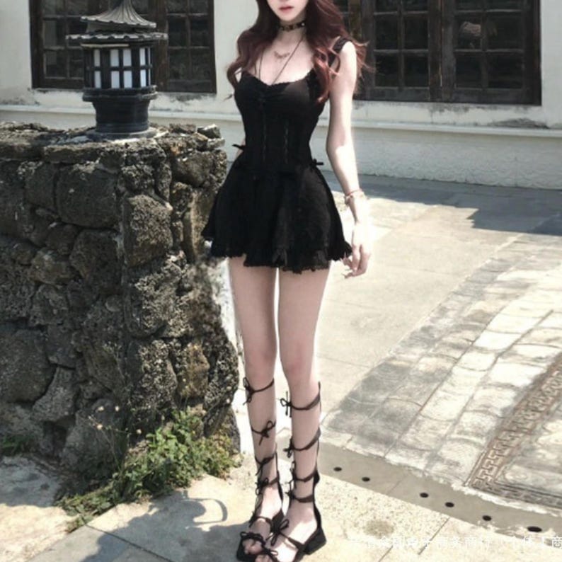 Lace Trim Mini Dress | Slim Fit Sleeveless Style | Y2K Gothic Grunge Streetwear

Lace trim slim mini dress with bow detail designed for women gothic styling and chic everyday outfits.