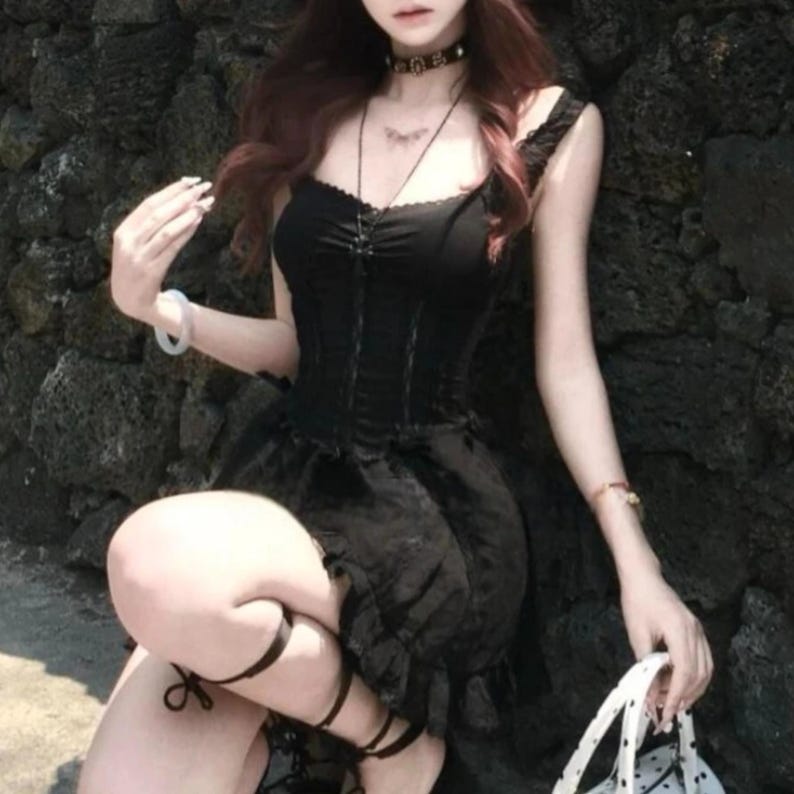 Lace Trim Mini Dress | Slim Fit Sleeveless Style | Y2K Gothic Grunge Streetwear

Lace trim slim mini dress with bow detail designed for women gothic styling and chic everyday outfits.