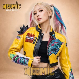 May include: Yellow leather jacket with black accents, featuring a unique design with patches and colorful artwork. The jacket has a cropped fit, a zipper closure, and spiked shoulder details. The jacket has the text "RITTTUMI" and "98994" on it.