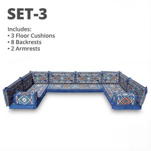 May include: A blue modular seating set with patterned cushions and backrests. The set includes 3 floor cushions, 8 backrests, and 2 armrests. The text "SET-3" is at the top of the image.