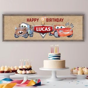May include: A rectangular birthday banner with a tan background and a black and white checkered border. It features illustrations of two cartoon cars, a gold trophy, and the text HAPPY BIRTHDAY LUCAS in red and white lettering with checkered flags.