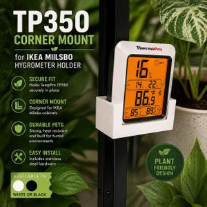 May include: A white corner mount for an IKEA Milsbo hygrometer holder, displaying temperature and humidity readings on an orange digital screen. The mount is designed for easy installation and is available in white or black.