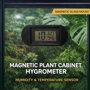 May include: A black magnetic plant cabinet hygrometer with a digital display showing temperature and humidity. The display reads 10 and 82.5%. The text "Magnetic Glass Mount" is in a yellow rectangle. The text "Magnetic Plant Cabinet Hygrometer" and "Humidity & Temperature Sensor" are also visible.