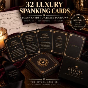 May include: A set of 32 black and gold luxury spanking cards with text including 32 LUXURY SPANKING CARDS, DISCIPLINE, CONNECTION, PLEASURE, THE RITUAL ATELIER, and various instructions for receiving lashes, cane strikes, and choosing implements.