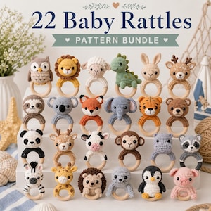 May include: A collection of 22 crocheted baby rattles featuring various animal designs, each attached to a smooth wooden ring. The animals include an owl, lion, sheep, dinosaur, rabbit, deer, sloth, koala, fox, elephant, tiger, bear, panda, cow, monkey, hippo, raccoon, zebra, giraffe, hedgehog, seal, penguin, and pig.
